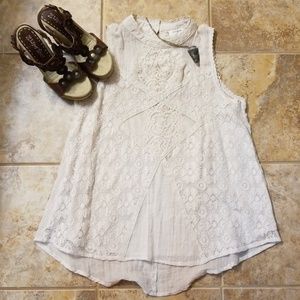 Umgee sleeveless tunic.